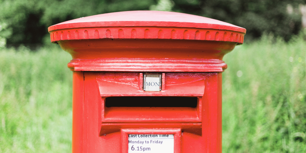 close up image of a red post box